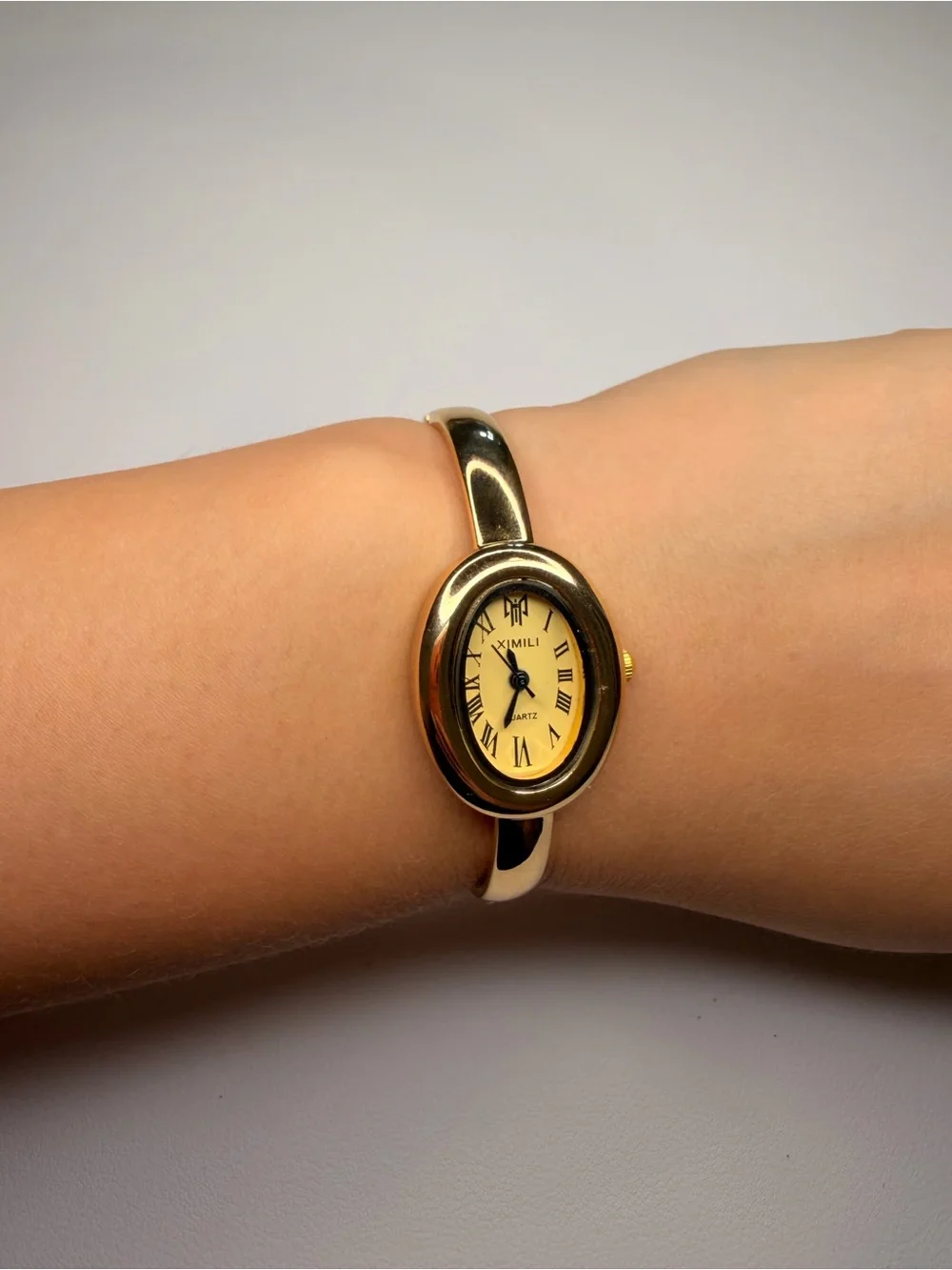 Elegant Gold-Tone Stainless Steel Bangle Watch - Picture 11 of 15